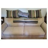 Cream Couch w/ Pillows & Blanket