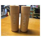 Pair of Chloe perfumed body powder--full