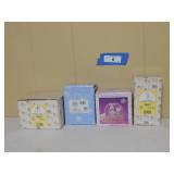 4 Precious Moments Figurines