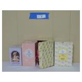 4 Precious Moments Figurines