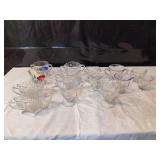 Assortment of Matching Cream and Sugar Bowls