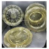 Four Vaseline Glass Plates