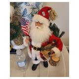 Santa Statue With The Flag
