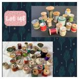 Large collection of wooden spools of thread