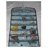 Collection of Faux Jewelry in Jewelry Hanger