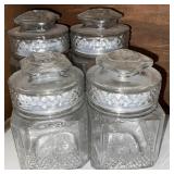 4pc Glass Lidded Decorative Jars