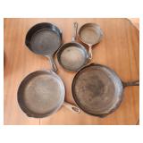5 Cast Iron Skillets. See pictures for details.