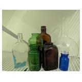Collection of Colored Glass Bottles