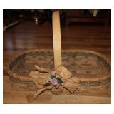 Woven Basket with Floral Accent and Wooden Handle