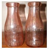 Pair of Pink Liberty Milk Co Glass Bottles