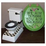 We Aim to Please Toilet Seat Hanger w/ Toilet