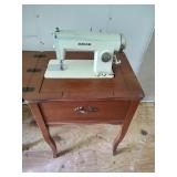 White Sewing Machine and Table