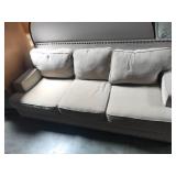 88-Inch Beige Upholstered Sofa with Nailhead Trim