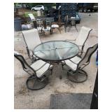 48-Inch Round Glass Patio Table with Four Chairs