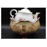 Porcelain Teapot with Floral Motifs and Floral Cer