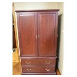 Cherry Wood Armoire With Brass Hardware