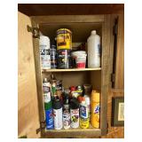 Cabinet Filled With Paints and Supplies