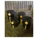 4 Black Canisters With SpoonsLargest Canister 8"