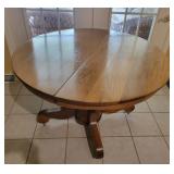 Oak Pedestal Table on Casters Oak Pedestal Table on Casters
