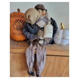 Fall-Themed Decorative Scarecrow and Pumpkins Fall-Themed Decorative Scarecrow and Pumpkins