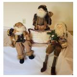 Three Santa Claus Figurines Three Santa Claus Figurines