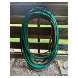 Metal Hose Holder with Garden Hose Metal Hose Holder with Garden Hose