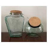 2 VTG. GREEN GLASS CANISTER JARS W/CORK LIDS 2 VTG. GREEN GLASS CANISTER JARS W/CORK LIDS