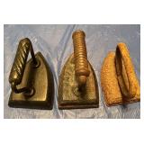 3 Antique Cast Iron Flat Irons-One has the number 3 Antique Cast Iron Flat Irons-One has the number