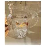 Glass Pitcher with Gold Details.