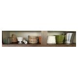 Bottom Shelf of Brown Garage Cupboard