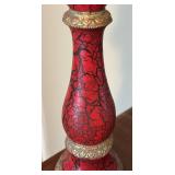 Two Red Candle Stick Holders With Candles