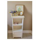 White Cabinet with Floral Decor