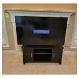 Vizio TV with Black Storage Stand