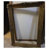 A handmade frame of gold in color.