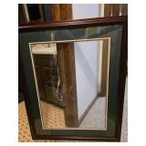 Dark brown frame with a teal matte.
