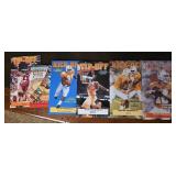 A box of U.T. books and Collector cards.