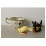 Porcelain Figures and Teacup