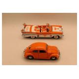 Two Orange-Themed Model Cars