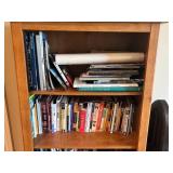 Art, Travel, and Language Books on Wooden Bookshel