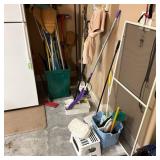 Cleaning Supplies Including Mops and Brushes