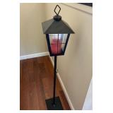 Metal Lantern With Red Candle