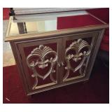 Mirrored Cabinet With Ornate Design