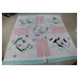 Handmade Patchwork Quilt with Wear
