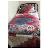 Twin Bed with Quilts and Accessories