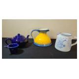 Three Ceramic Pitchers and Teapot