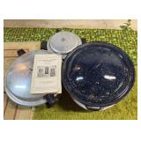 2 large metal pressure canners and a dark blue