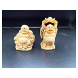Two Buddha Figurines