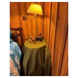 Table with Lamp and Animal Figurines