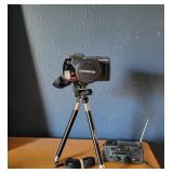 Olympus Camera and Eton Radio Set