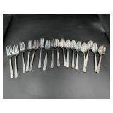 Heirloom Plate and Others Silverware Set